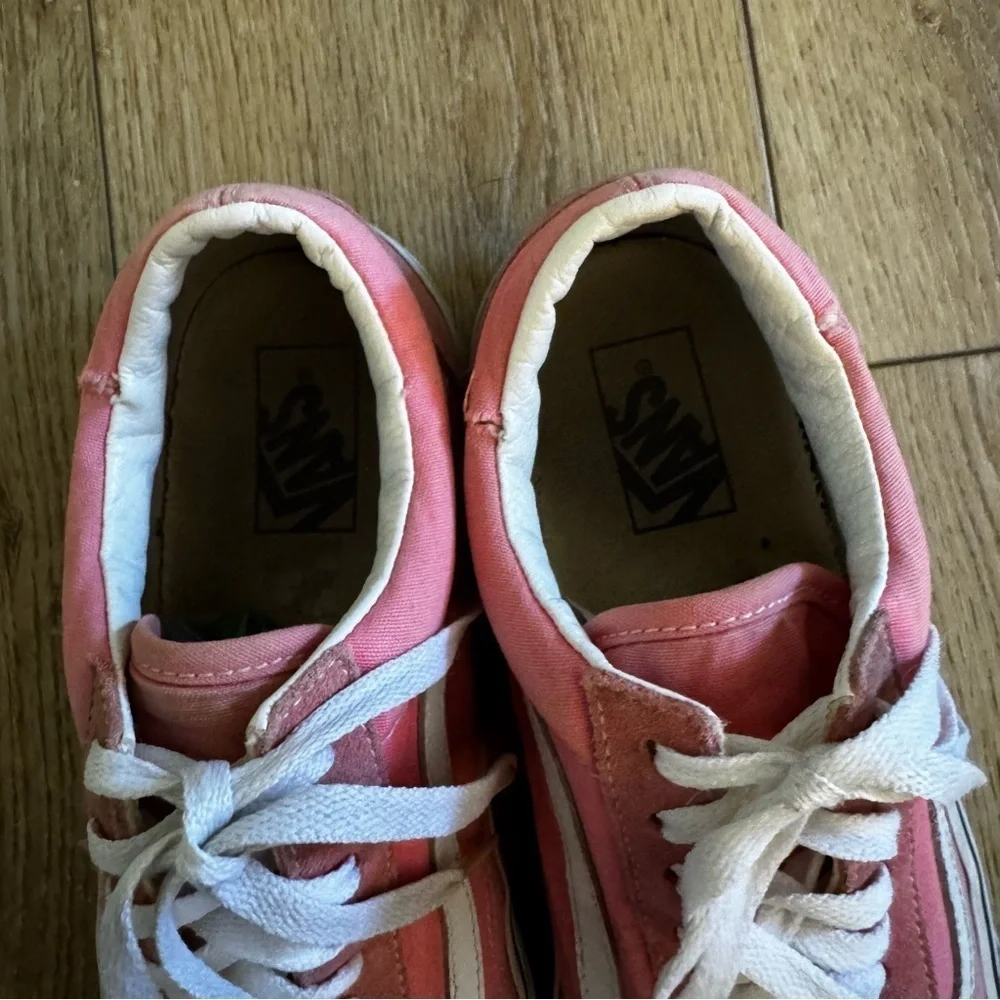 Pink and white Vans sneakers, lace up, suede tips, size 9.5 M or 11 W.